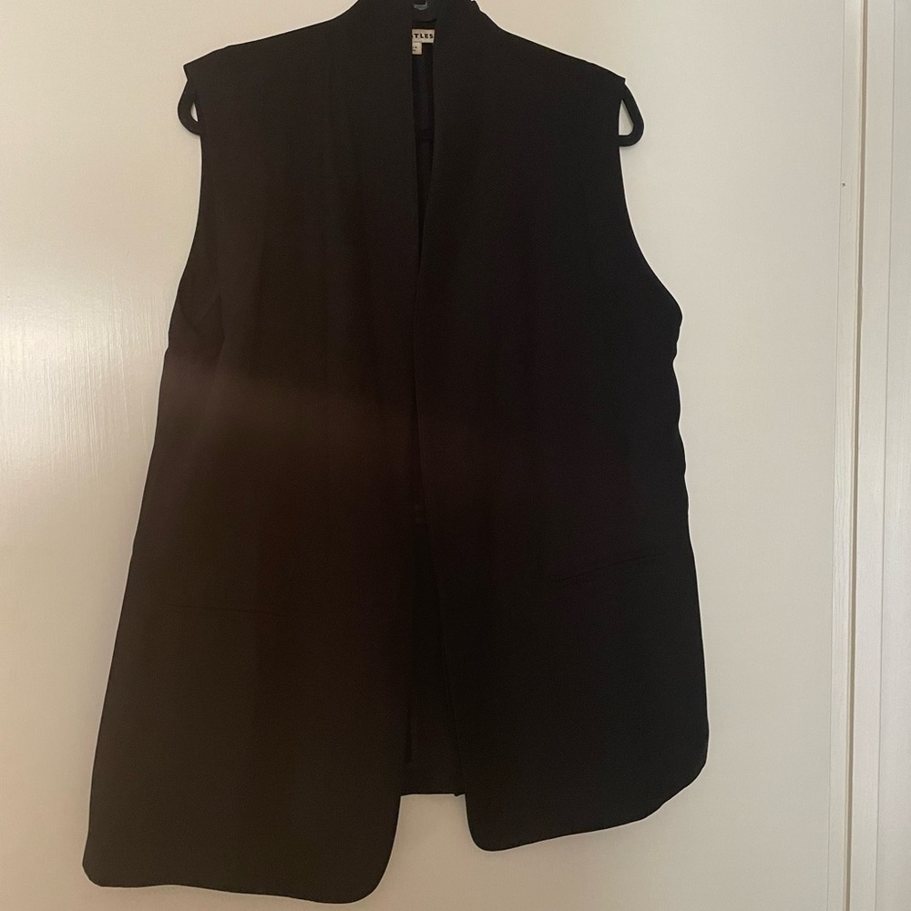 Black long vest-109% polyester. Whistle’s brand.